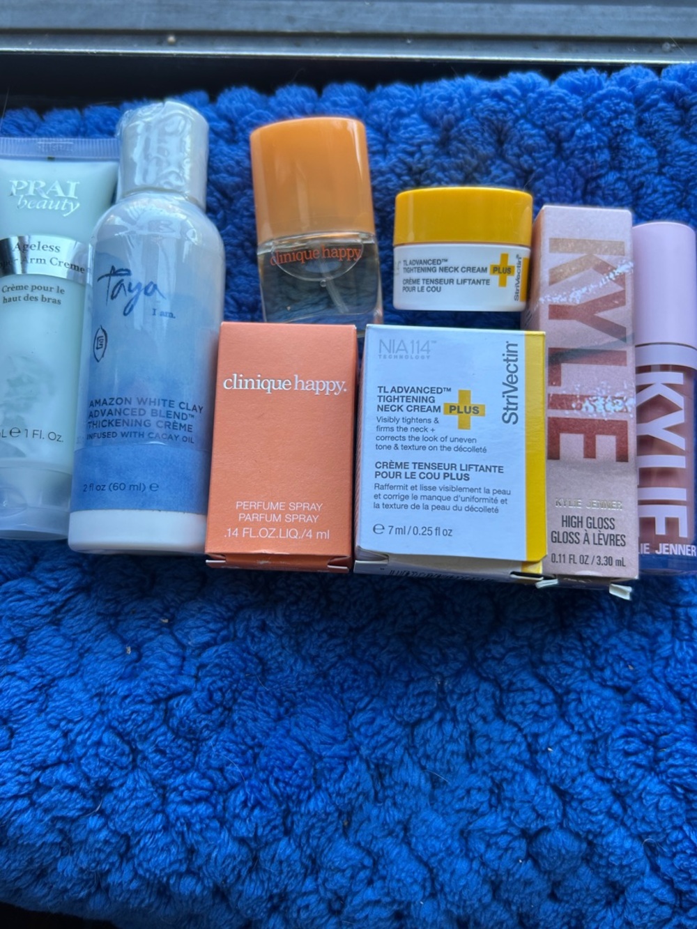 Kylie Jenner High Gloss + StriVectin + Taya Amazon White Clay + Clinique HAPPY